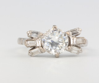A brilliant cut single stone diamond ring, approx. 1.75ct, colour H/I, clarity WS1, the 6 baguettes approx. 0.5ct, 6 grams, size P 