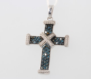 A silver, blue and white diamond cross pendant, 2.9 grams, 35mm 