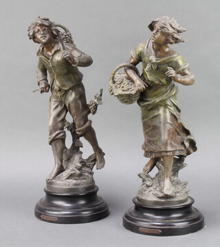 A pair of French spelter figures of a boy and girl fruit pickers, the bases marked Vendangeuse, raised on socle bases 40cm x 17cm 