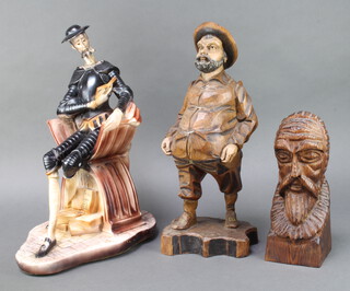A turned wooden figure of a standing sancho pancho 42cm h x 17cm w x 12cm d, a plaster seated figure of Don Quixote reading 40cm h x 23cm w x 31cm d (head f and r, hat chipped) together with a carved wooden portrait bust of a gentleman 24cm h x 9cm w x 9cm d 