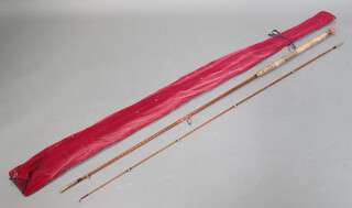 A Carter & Co. 10' split cane two piece Avon/carp fishing rod, close whipped with agate eyes, contained in a red cloth bag 