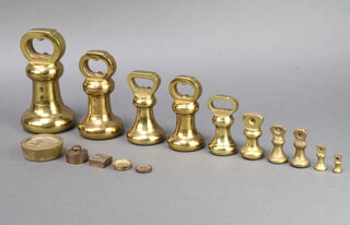 10 various brass bell weights - 7lb, 4lb, 2lb (x2), 1lb, 8oz, 4oz, 2oz, 1oz and 1/2oz together with 5 other weights