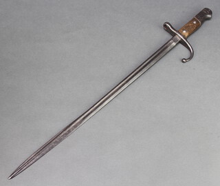 A Continental chassepot style bayonet with Arabic style script to the base, the blade 52cm long 
