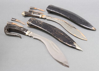 A Kukri, the 29cm blade marked India with carved horn elephant grip, 2 skinning knives and 1 other (slight rust to blade, both scuffed to scabbards) 