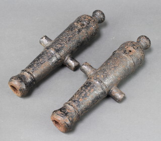 A pair of 19th Century iron signalling canons with 32cm unmarked barrels, 32cm x 12cm, the bore is 2cm 