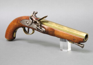 An early 19th century (circa 1830) Naval Officers flintlock pistol. The brass octagonal barrel measuring 7.5 inches and approx 18 bore with mahogany stock. Signed SHARPE on the lock plates with the breeches signed LONDON and stamped with Birmingham proof mark and view mark. The tang and lock plate with engraved leaf motif, the brass trigger guard engraved sunburst motif. The brass butt plate also engraved. Complete with steel ramrod.