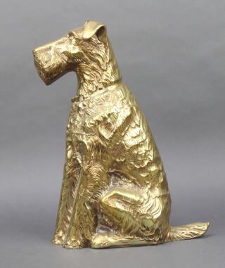 A brass door stop in the form of a seated Airedale Terrier, the reverse marked C & A RD832526 42cm x 30cm x 7cm 