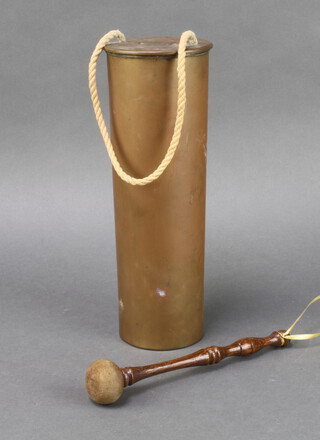 A First World War brass Trench Art gong formed from an 18lb shell dated 1914, complete with beater 