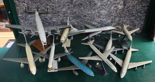 A plastic model of a Lockheed Super G constellation aircraft together with other model aircraft