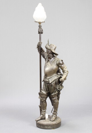 After Augustus Poitevin, a spelter table lamp of a standing cavalier with glass lightshade, the base marked Tetronde 118cm h x 24cm diam. to the base 
