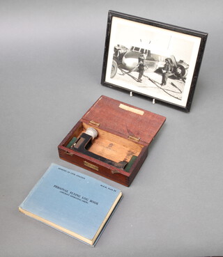 A Civil Aviation personal logbook to William Frederick Townsend 1952-1964 featuring air crash of a Viking 17th/8/1953 together with a black and white photograph of the aircraft 15cm x 20cm together with a boxed inclinometer  