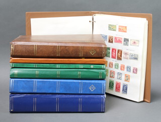 A ring album of used New Zealand stamps, 4 stock books of used GB stamps Victoria to QEII, 2 stock books of world stamps