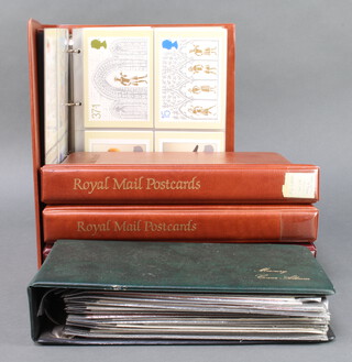 An album of Elizabeth II GB first day covers together with 4 albums of GB PHQ cards