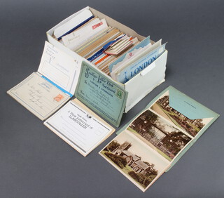 A quantity of various postcards 