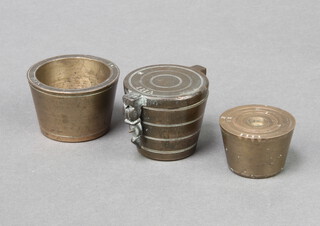 Seven 18th Century bronze nesting apothecary bucket weights, base marked R, together with a single ditto 