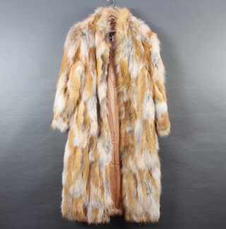 A lady's full length fox fur coat by Saga Fox 