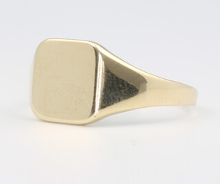 A 9ct yellow gold signet ring, size V 1/2, 3.3 grams