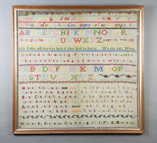 A Victorian stitchwork sampler by Susannah Chanter aged 13, 1876, St Mary's School with alphabet and motto 64cm x 66cm 