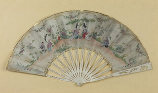A 19th century Chinese painted fan decorated with figures in a garden with pierced bone sticks 25.5 cm framed
