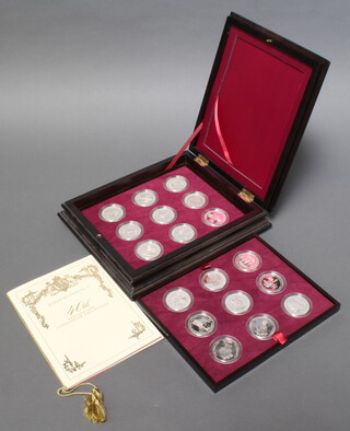 A set of 18 Queen Elizabeth II 40th anniversary Coronation crown collection, each approx. 28.28 grams 
