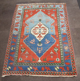 A blue and tan ground Caucasian style carpet 282cm x 201cm 