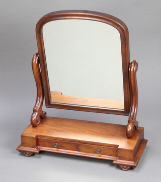 A Victorian arched plate dressing table mirror contained in a mahogany frame, the rectangular base fitted 2 drawers raised on shaped supports 72cm h x 61cm w x 25cm d 