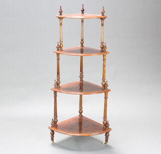 A Victorian inlaid and figured walnut 4 tier corner what-not, raised on reeded columns and ceramics casters 138cm h x 44cm w to the base x 44cm d  