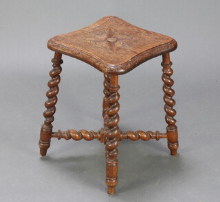 A Victorian shaped and carved oak stool raised on spiral turned supports with H framed stretcher 46cm h x 33cm w x 33cm d 