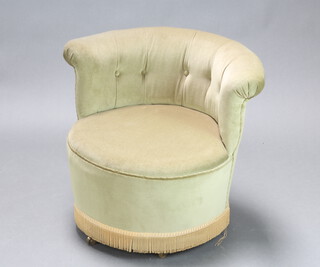 A 1940's tub back boudoir chair upholstered in green buttoned material 59cm h x 70cm w x 60cm d (seat 35cm w x 39cm d)