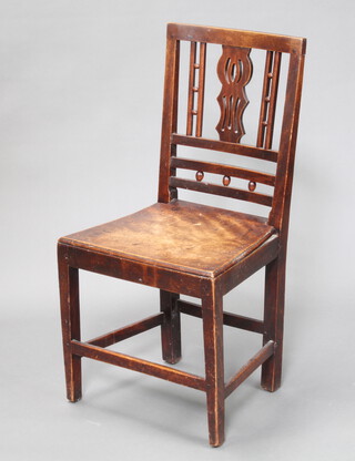 A Georgian mahogany slat back hall chair with solid seat, raised on turned supports 