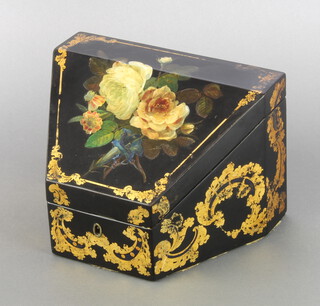 A Victorian black papier mache and foil patterned wedge shaped stationery box with fitted interior 14cm h x 20cm w x 15cm d  