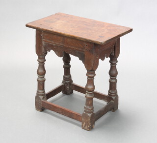 A Victorian oak joined stool raised on turned and block supports 53cm h x 63cm w x 31cm d 