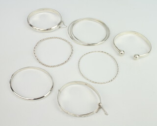 A quantity of silver bangles, 100 grams