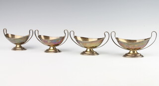 A set of 4 Georgian style silver boat shaped table salts, London 1906, 250 grams 