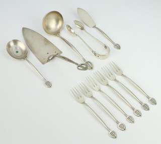 A stylish Continental 934 service comprising server, tongs, ladle, sifter spoon, knife and 6 small forks with enamelled dot decoration and pierced handles 370 grams 