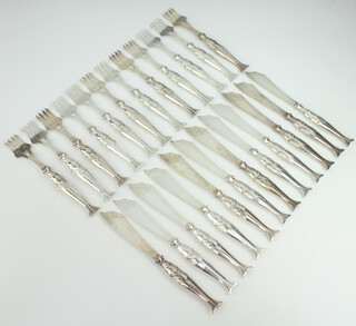 A set of plated WMF fish eaters with fish handles for 12 