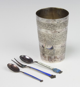 Two Continental silver and guilloche enamel spoons and a ditto fork together with a white metal beaker 10cm 
