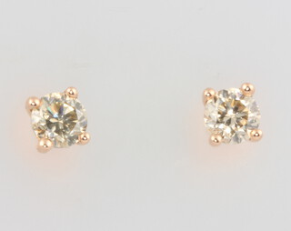 A pair of 18ct rose gold single stone diamond solitaire ear studs approx. 0.48ct, 1 grams