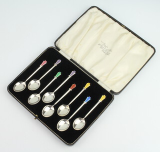 A set of 8 Art Deco silver and guilloche enamel coffee spoons cased, Birmingham 1939, 64 grams