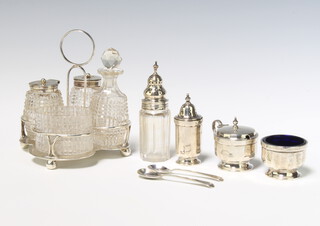 A matched silver 4 bottle cruet set, Sheffield 1908 and Birmingham 1903 together with a 3 piece condiment and a mounted bottle, weighable silver 376 grams 
