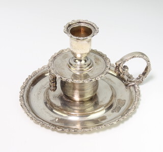 A silver chamber stick with swivel sconce on a fancy scroll handle Chester 1900, 230 grams