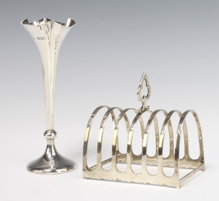 A silver 7 bar, dome topped toast rack Birmingham 1919, 116 grams together with a weighted silver tapered posy vase 16cm 