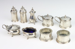 A silver condiment set Birmingham 1936, ditto Sheffield 1916, weighable silver 324 grams 