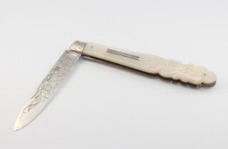 A Victorian silver mounted and engraved mother of pearl fruit knife, marks rubbed, 9cm, cased (a/f)