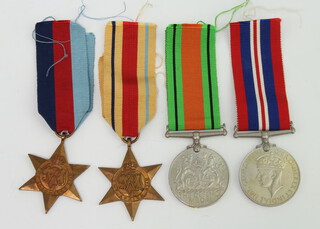 A 1939-45 Africa Star, War medal and Defence medal 