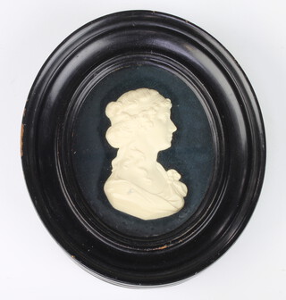 A carved ivory portrait miniature of a lady inscribed Mrs A Stewart 1795 contained in an oval frame 13cm x 12cm 