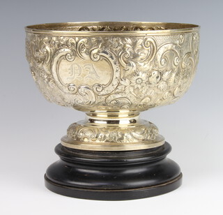 A Victorian repousse silver rose bowl profusely decorated with flowers and monogram London 1894, 23cm, 830 grams 