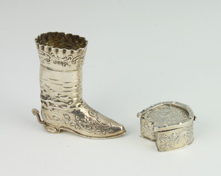 A Continental miniature silver model of a boot with floral decoration, import marks London 1898 together with a horseshoe shaped box 60 grams  