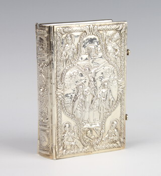 A Continental silver repousse bible cover decorated with biblical scenes 210 grams, 10.5cm 