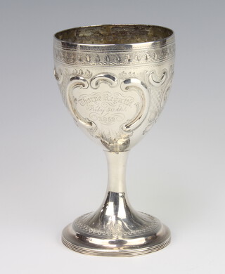 A Victorian Irish silver cup with engraved inscription decorated with flowers Dublin 1894, 16cm, 200 grams